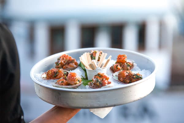 Oysters topped with ceviche and caviar